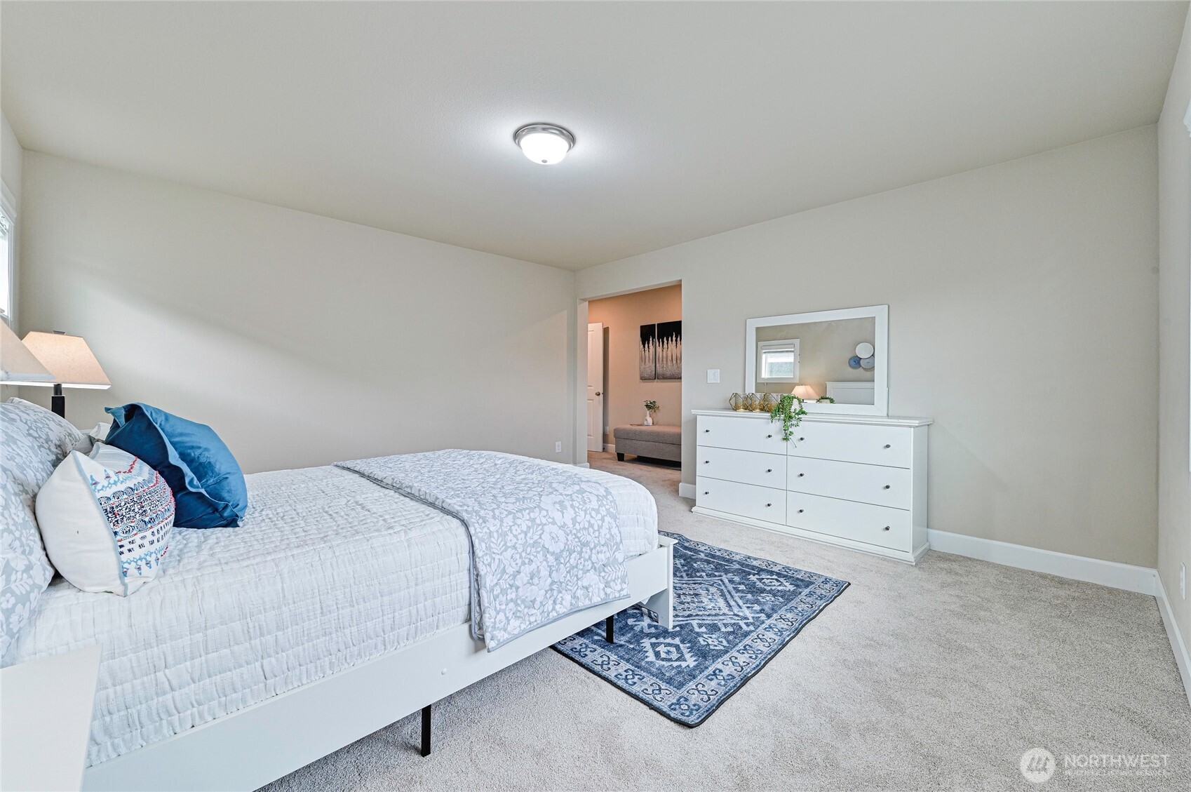 17312 40th Avenue Southeast Bothell, WA 98012 - Photo 20 of 34 a bedroom with a bed and a dresser