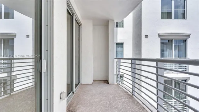 a view of a hallway with workspace