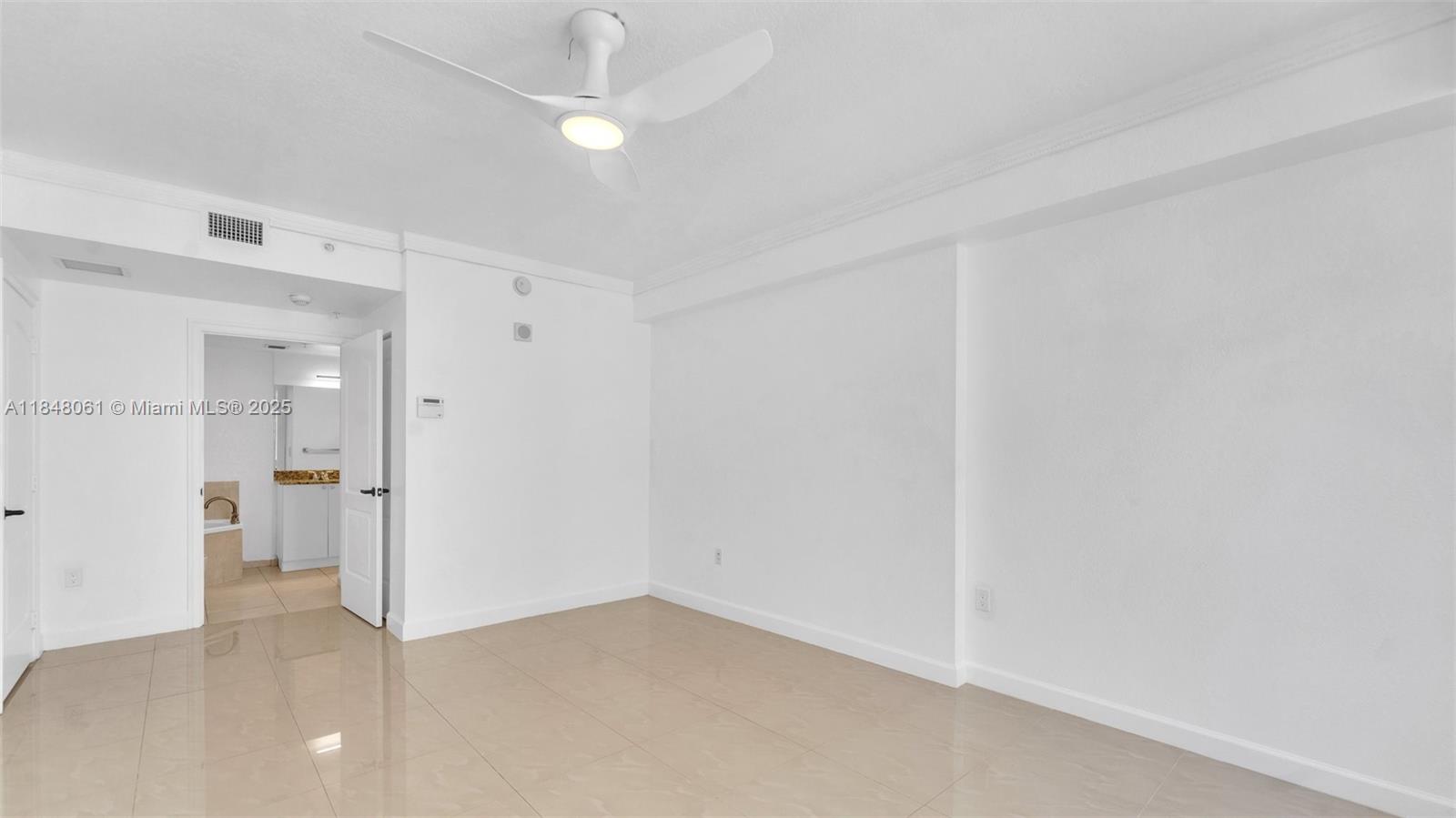 1830 Radius Drive, Unit 405 Hollywood, FL 33020 - Photo 9 of 19 wooden floor in an empty room