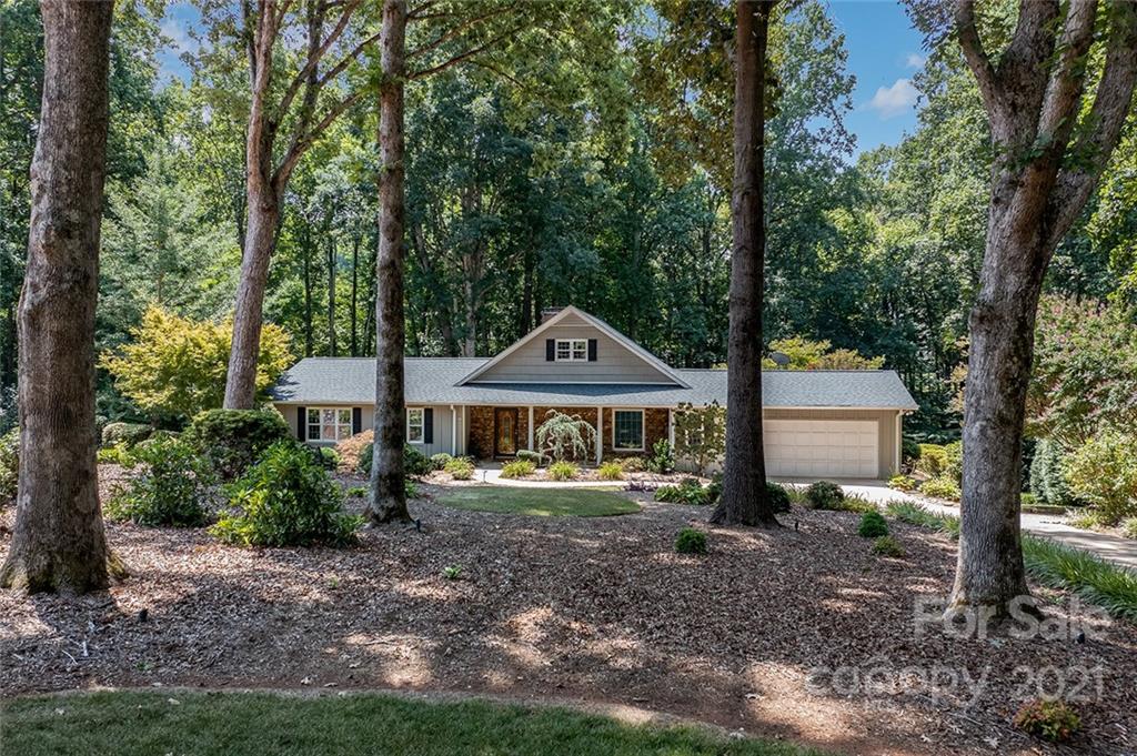 3243 Weidner Road Newton, NC 28658 - Photo 1 of 4 a front view of a house with garden