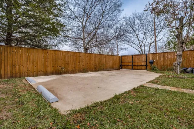 a view of backyard with green space