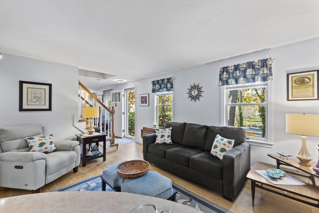 100 Orchard Drive Eastham, MA 02642 - Photo 12 of 31 a living room with furniture and a window