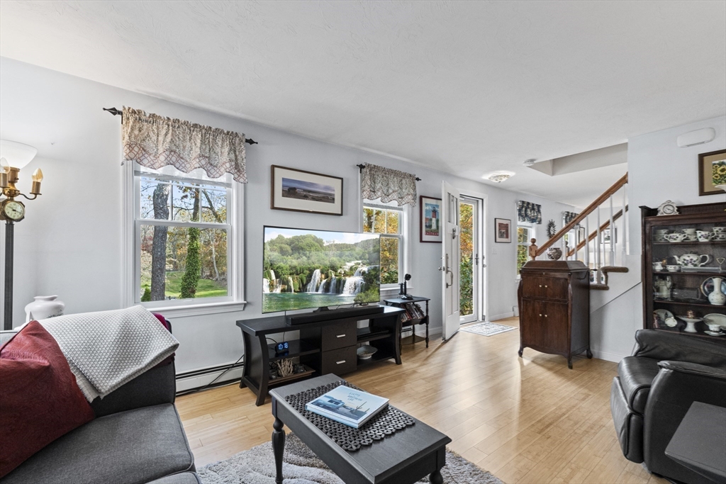 100 Orchard Drive Eastham, MA 02642 - Photo 13 of 31 a living room with furniture and a window
