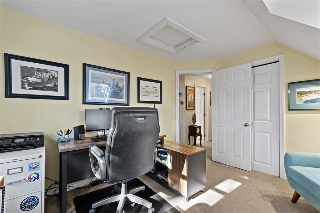 100 Orchard Drive Eastham, MA 02642 - Photo 21 of 31 a view of a workspace with furniture and a window