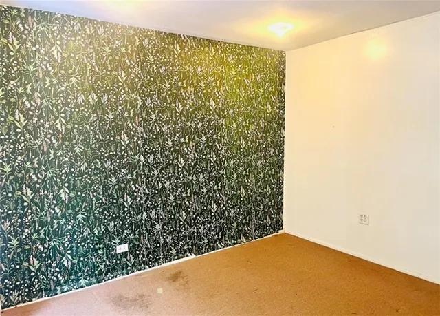 a view of a big yard with an outdoor space