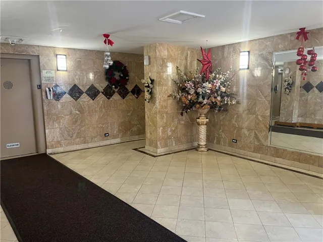 a view of a street with cars