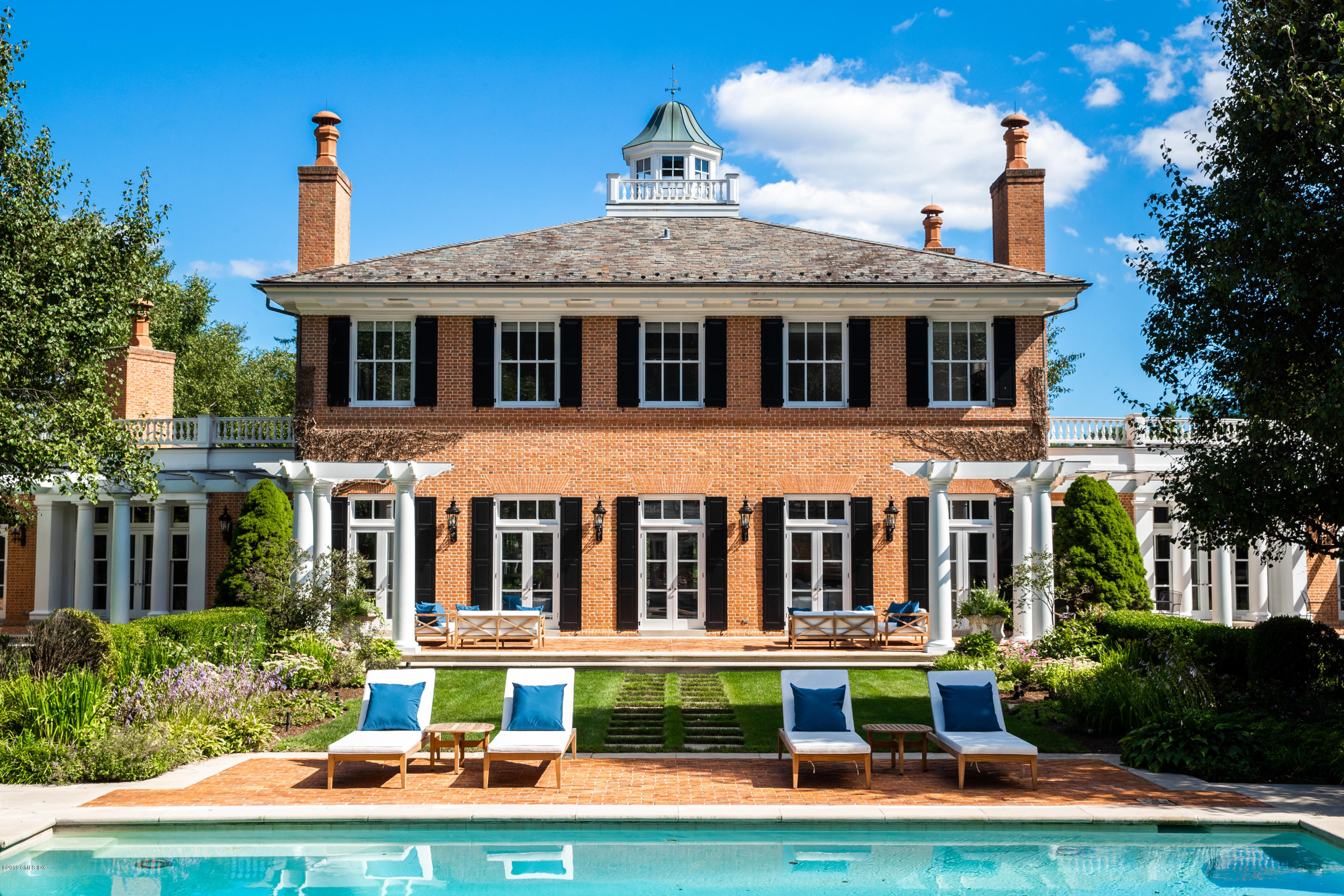 a front view of house with a yard