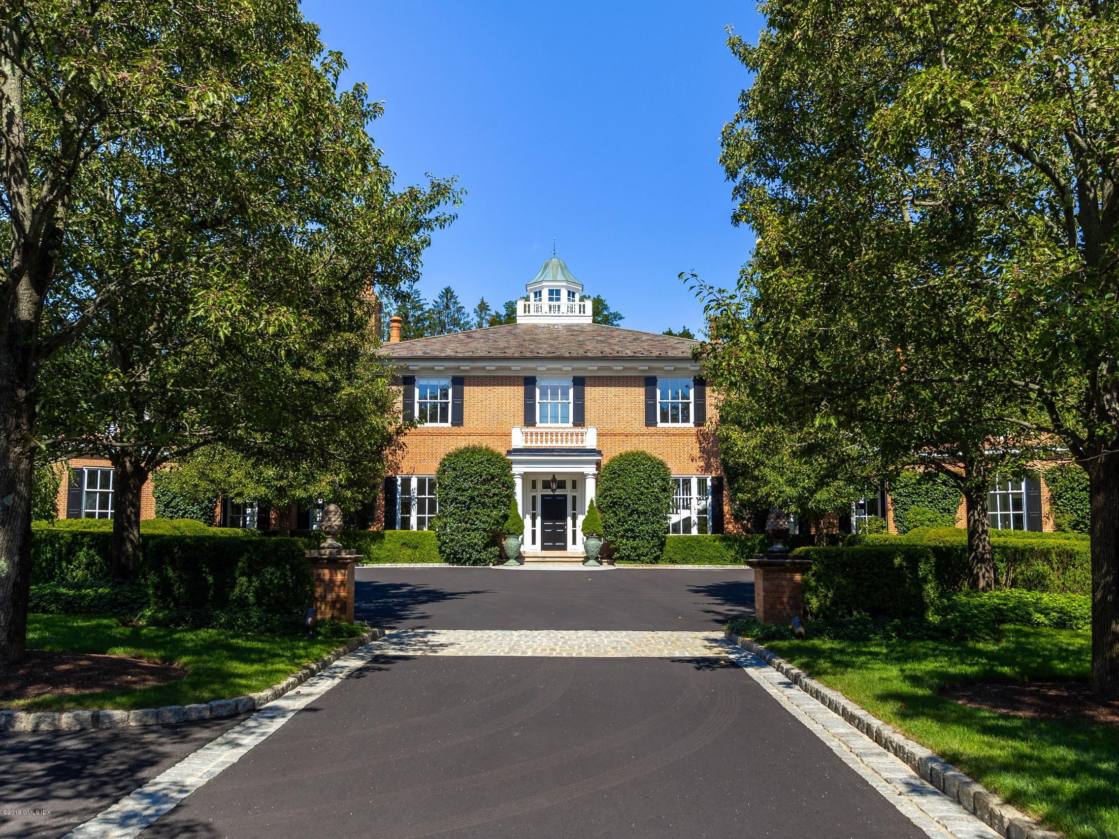 16 Andrews Farm Road Greenwich, CT 06831 - Photo 2 of 44 a view of road with yard and green space