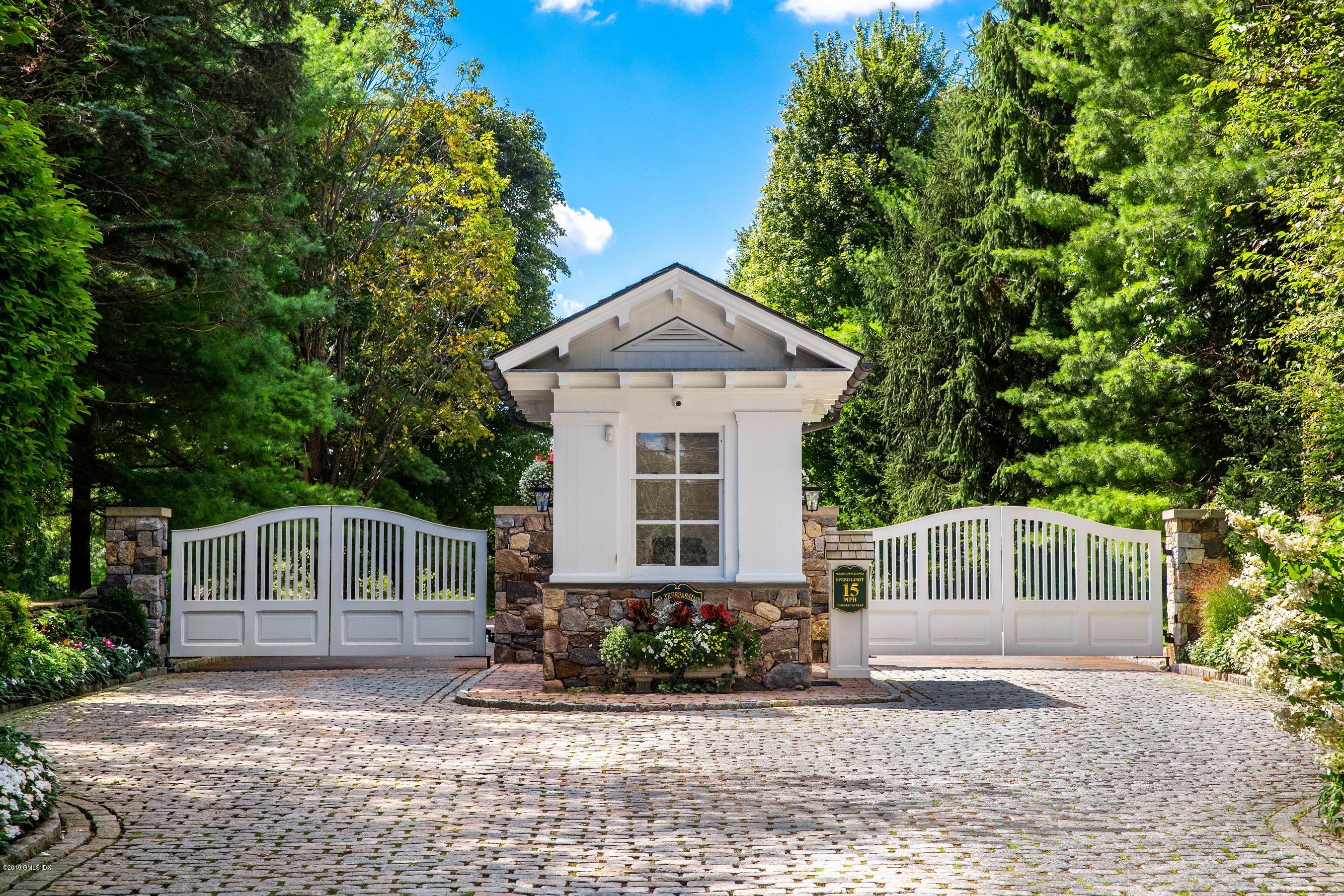16 Andrews Farm Road Greenwich, CT 06831 - Photo 43 of 44 a front view of a house with garden