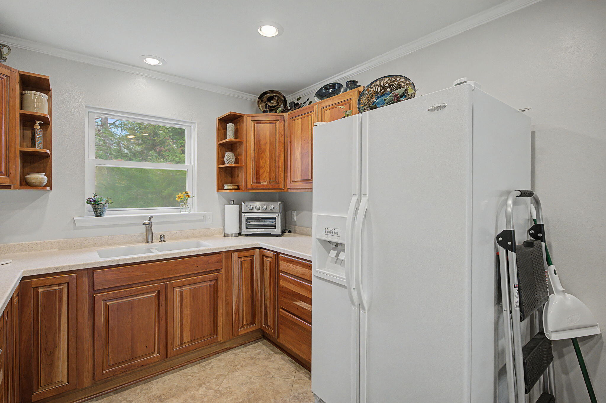 6730 Owens Road Laurel Hill, FL 32567 - Photo 29 of 36 a kitchen with a sink appliances and cabinets