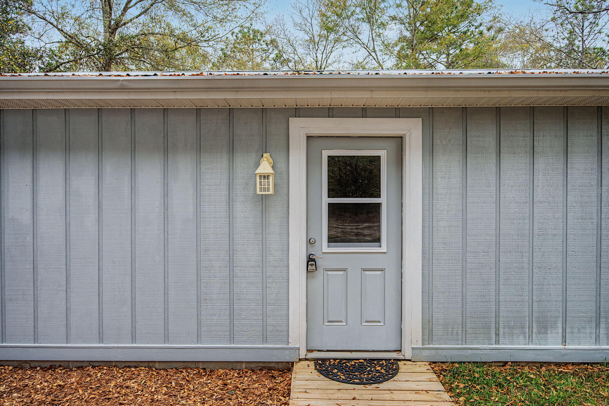 6730 Owens Road Laurel Hill, FL 32567 - Photo 6 of 36 a view of wooden door