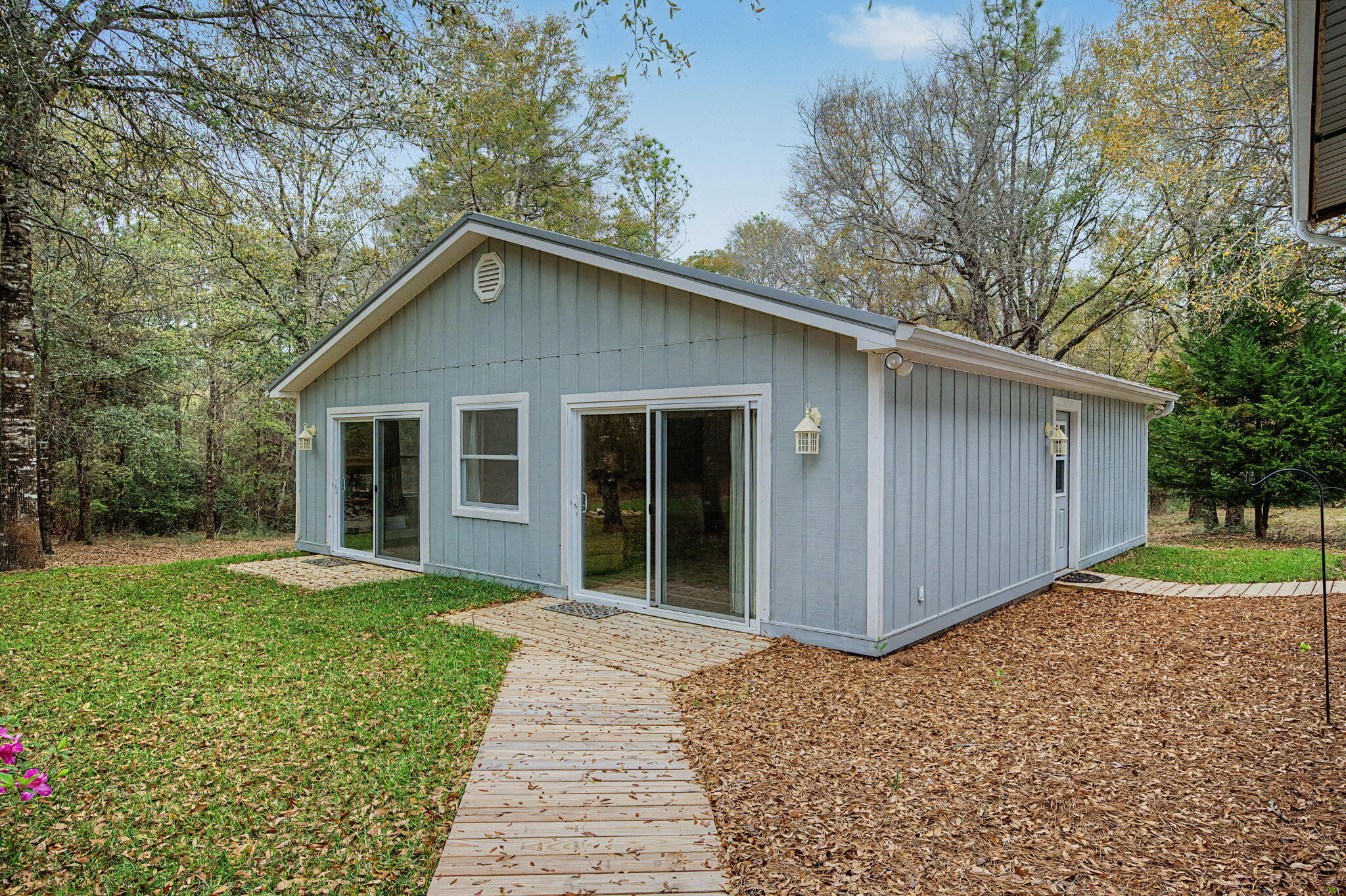 6730 Owens Road Laurel Hill, FL 32567 - Photo 7 of 36 a view of a house with a yard