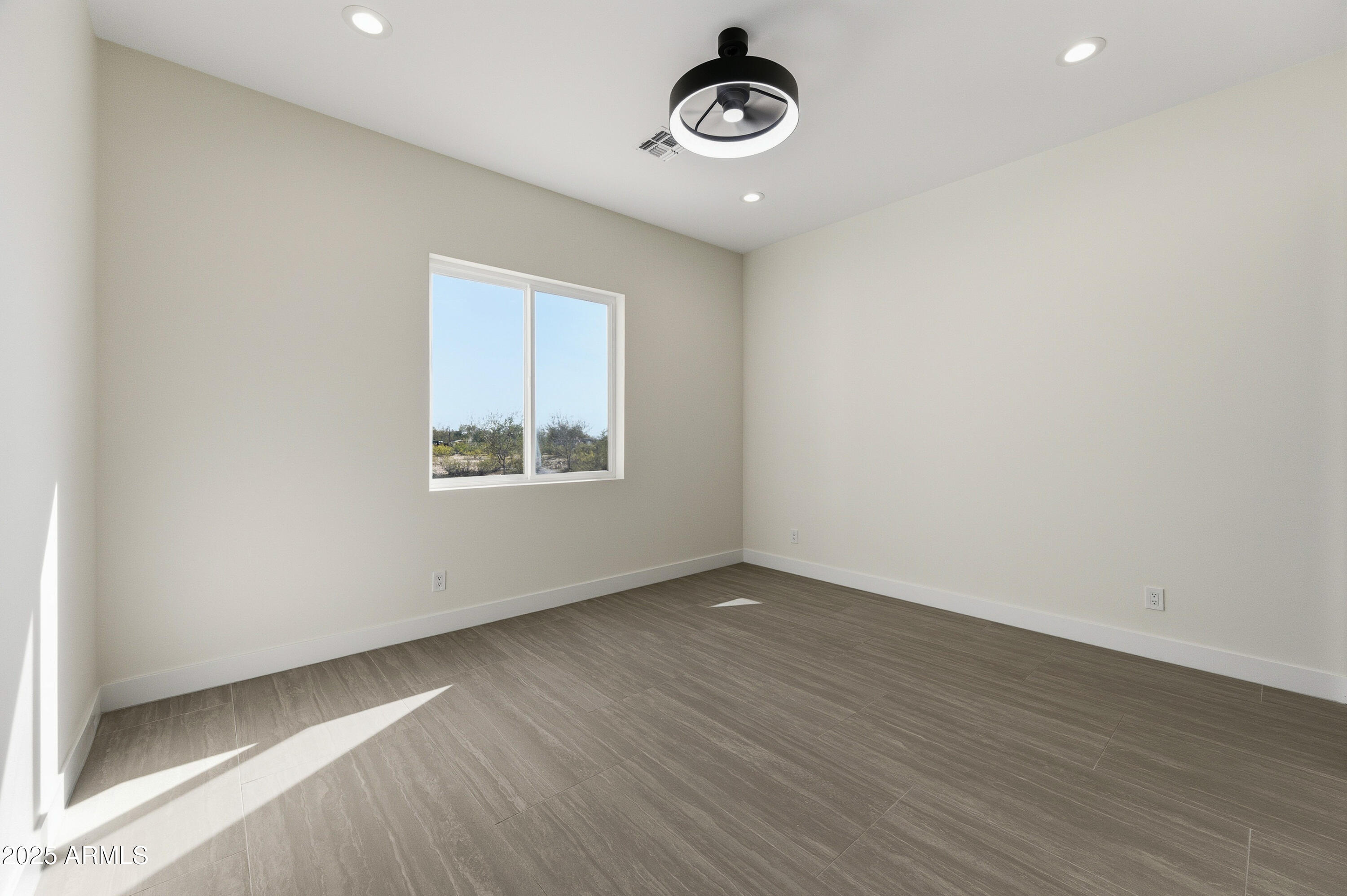10039 North Burris Road Casa Grande, AZ 85122 - Photo 58 of 61 an empty room with a window
