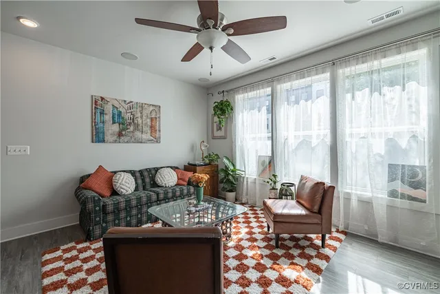 a view of a hallway with a window