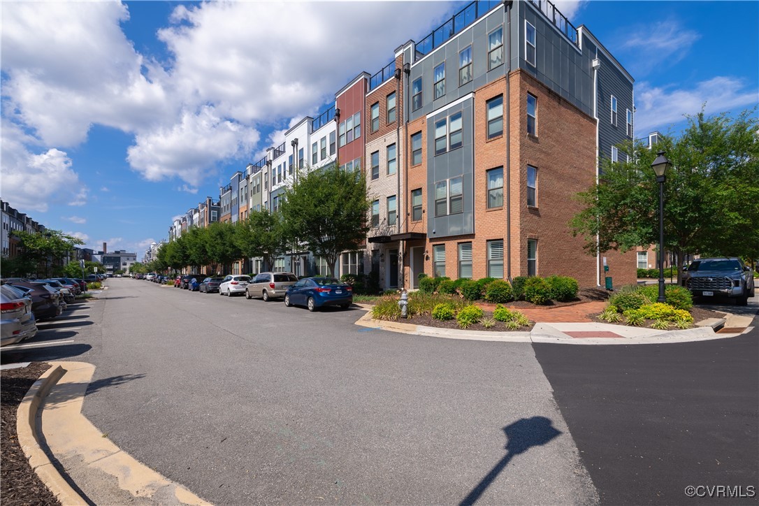 5329 Old Main Street, Unit A Henrico, VA 23231 - Photo 2 of 39 a city street lined with buildings and trees