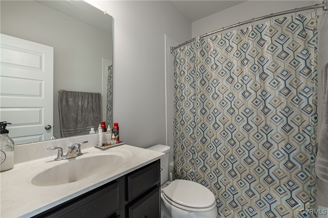5329 Old Main Street, Unit A Henrico, VA 23231 - Photo 24 of 39 a bathroom with a sink and a toilet