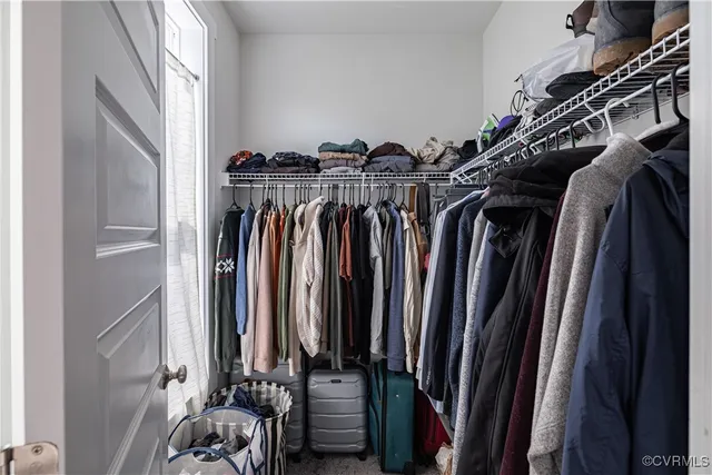 a bathroom with double vanity sinks and a mirror
