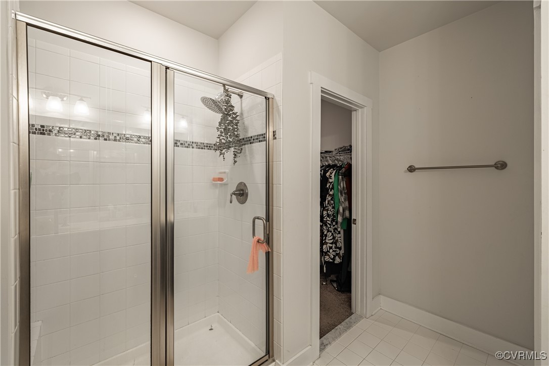 5329 Old Main Street, Unit A Henrico, VA 23231 - Photo 31 of 39 a bathroom with a glass shower door and a mirror