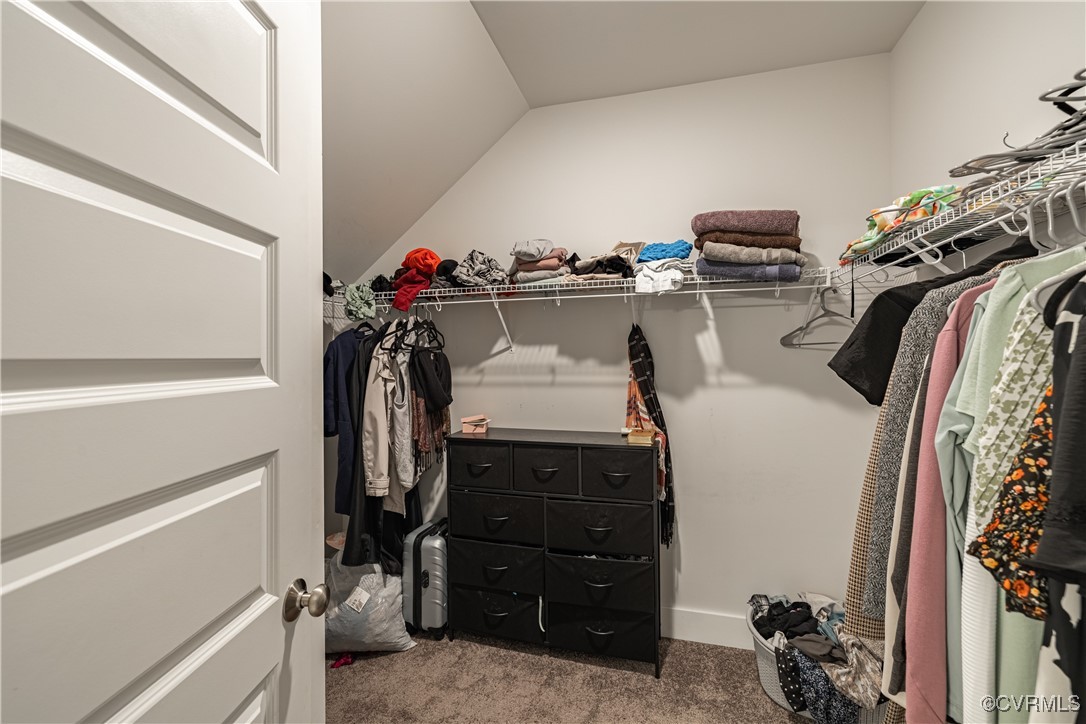 5329 Old Main Street, Unit A Henrico, VA 23231 - Photo 32 of 39 a view of walk in closet with clothes and shoes