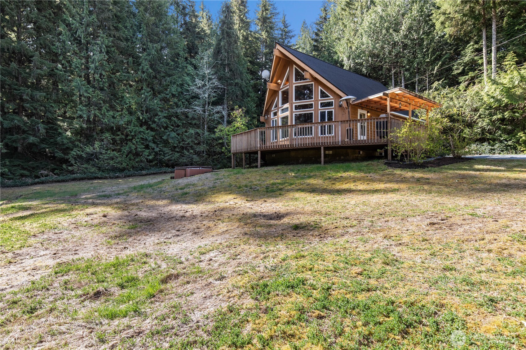 27525 West Lake Riley Road Arlington, WA 98223 - Photo 22 of 40 a front view of a house with a yard