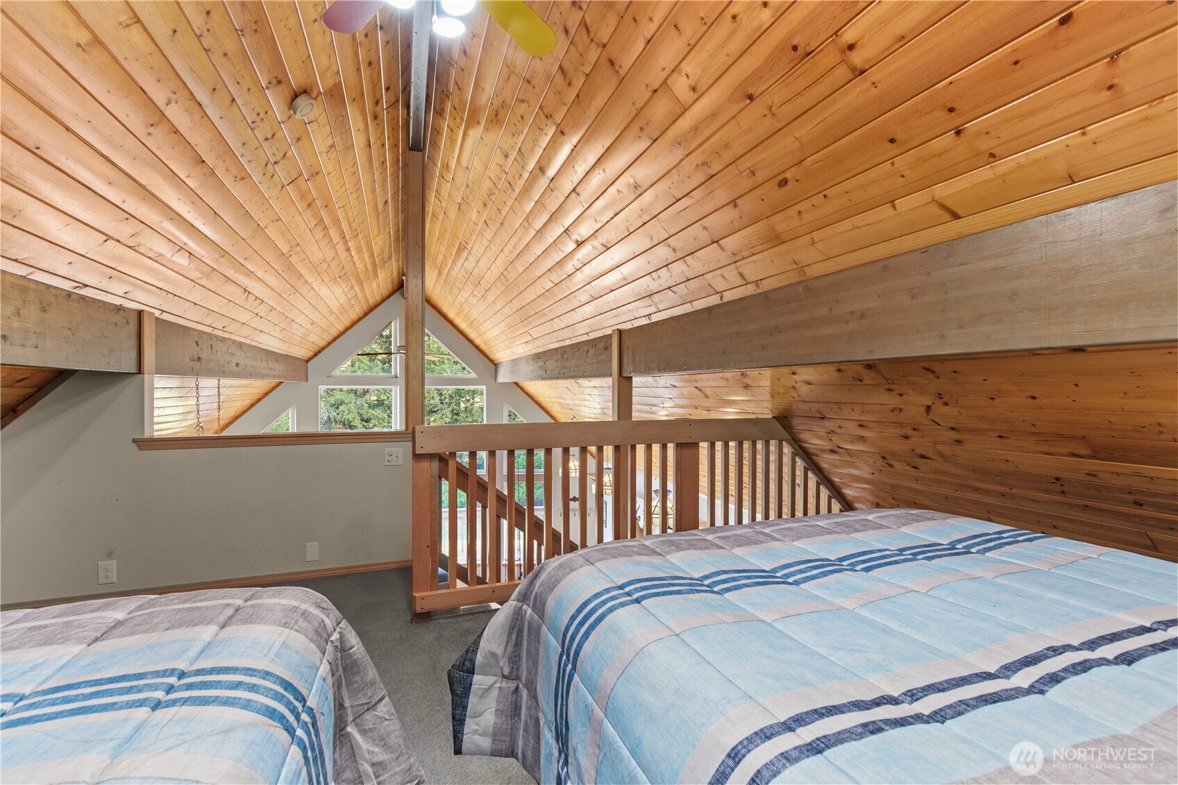27525 West Lake Riley Road Arlington, WA 98223 - Photo 31 of 40 a bedroom with a bed and a window