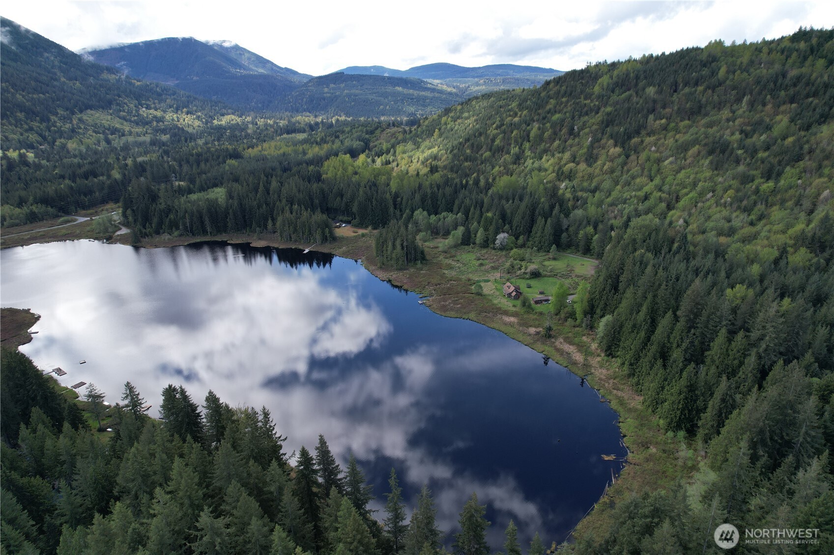 27525 West Lake Riley Road Arlington, WA 98223 - Photo 36 of 40 a view of a lake in middle of forest