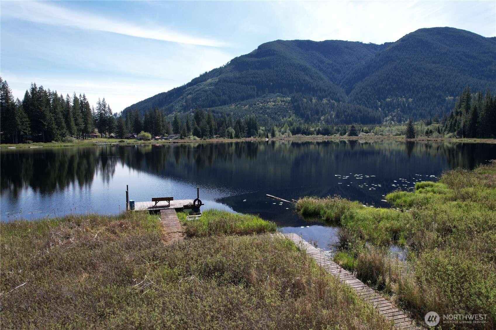 27525 West Lake Riley Road Arlington, WA 98223 - Photo 6 of 40 a view of a lake in a town with mountains and lake