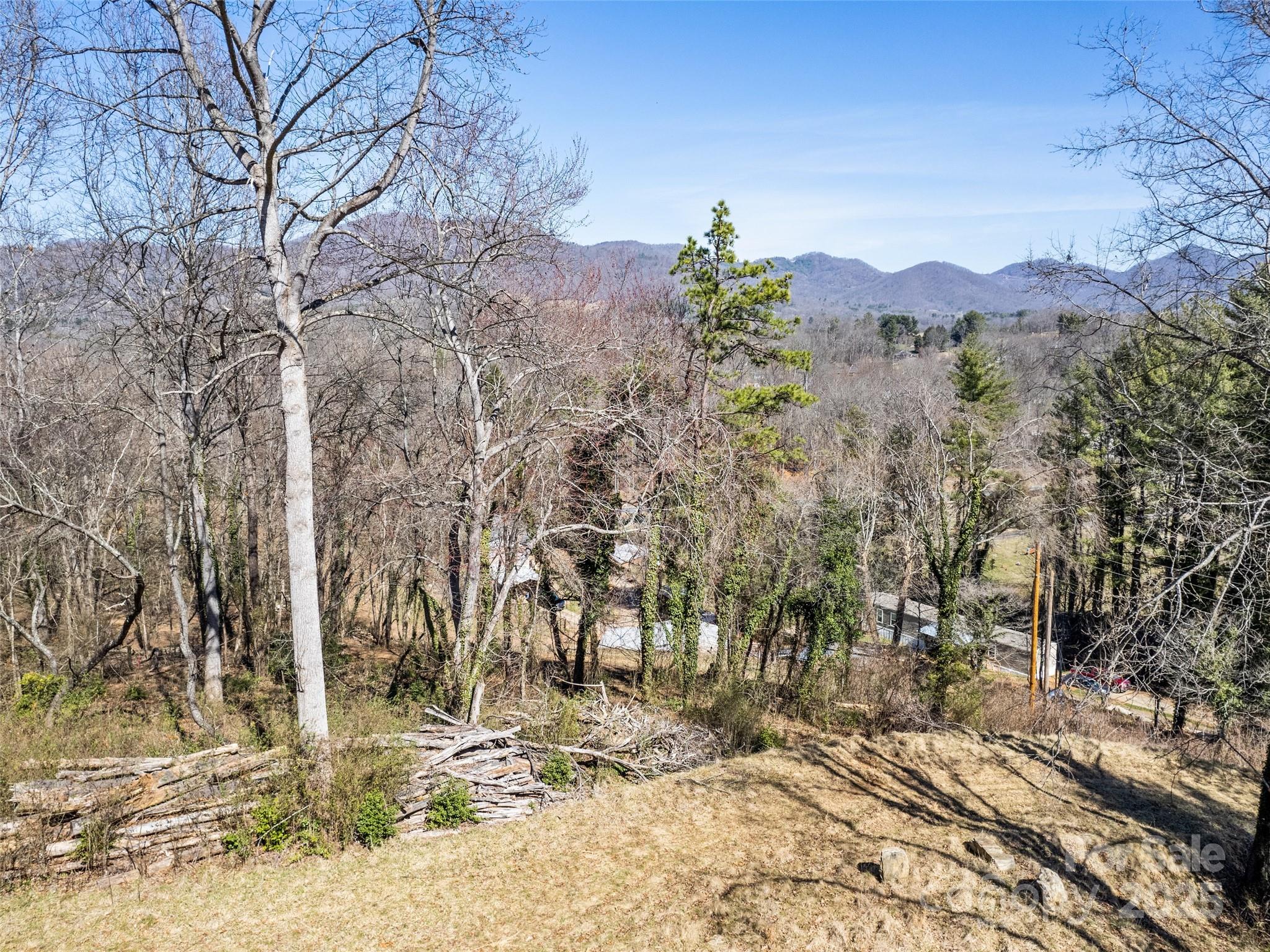 157 Harveys Mountain Road Clyde, NC 28721 - Photo 7 of 16 a view of a city with a pathway