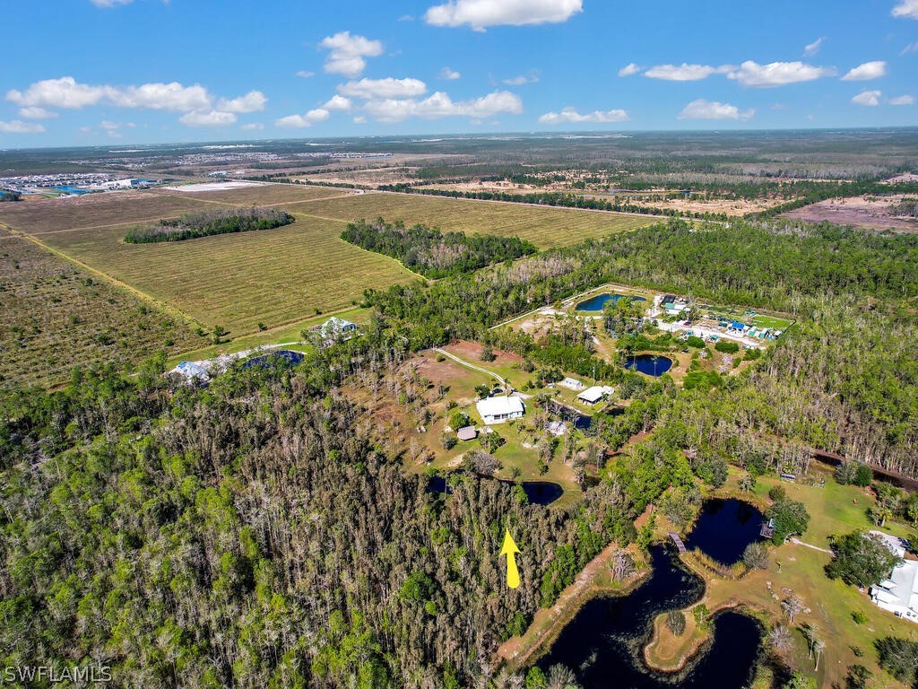 20401 Carter Road Estero, FL 33928 - Photo 42 of 42 a view of an ocean and a mountain