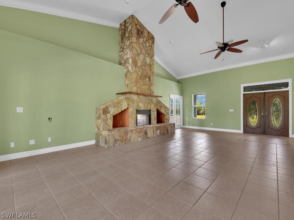 20401 Carter Road Estero, FL 33928 - Photo 8 of 42 a view of a livingroom with a furniture and chandelier fan