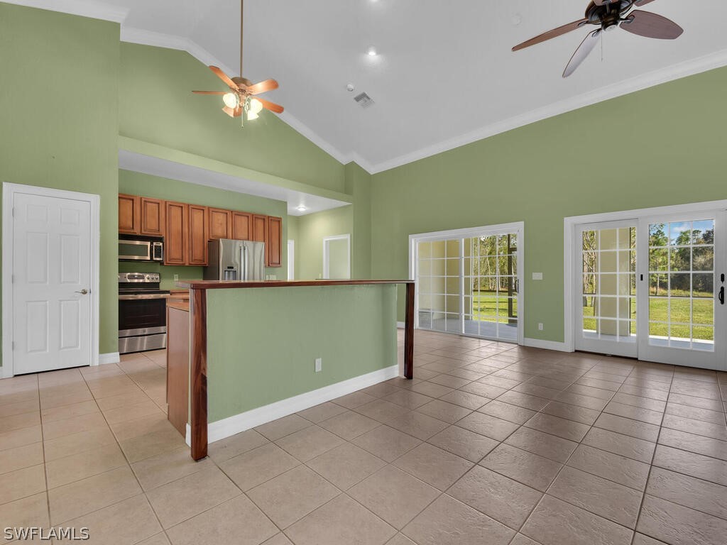 20401 Carter Road Estero, FL 33928 - Photo 10 of 42 a view of a kitchen with furniture and a kitchen
