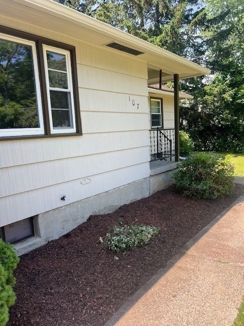 107 Valley Road Springfield, MA 01119 - Photo 13 of 14 a front view of a house with a yard