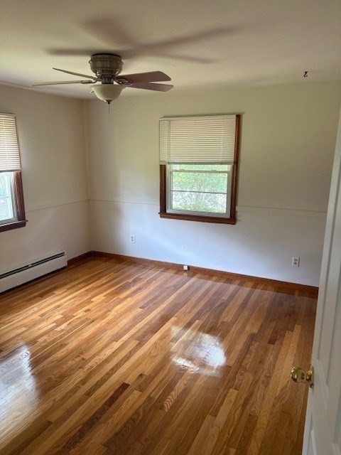 107 Valley Road Springfield, MA 01119 - Photo 7 of 14 a view of empty room with wooden floor and fan