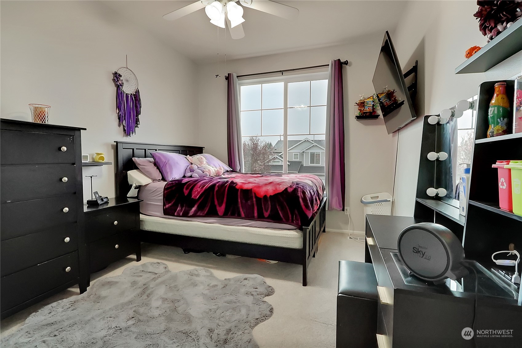 16004 24th Street East Lake Tapps, WA 98391 - Photo 18 of 32 a bedroom with bed and a window