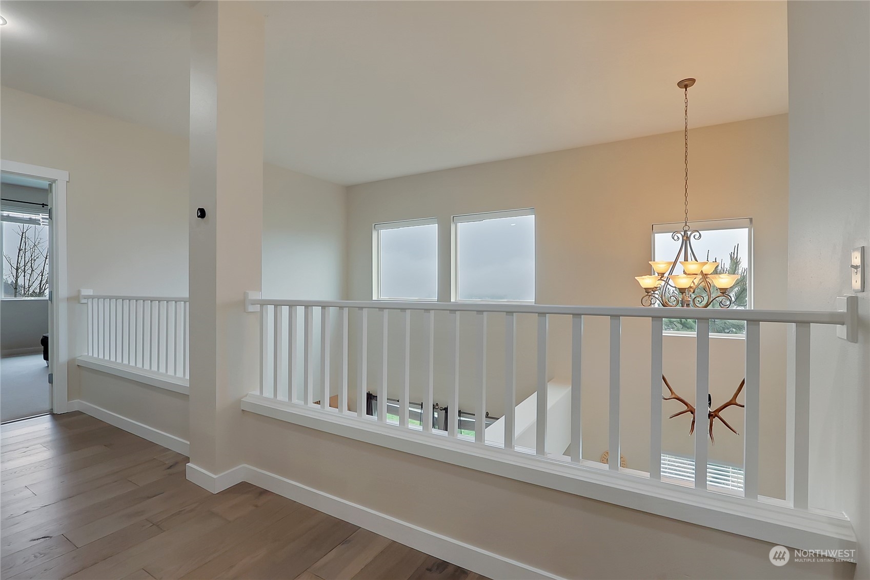 16004 24th Street East Lake Tapps, WA 98391 - Photo 21 of 32 a view of a dining room with wooden floor