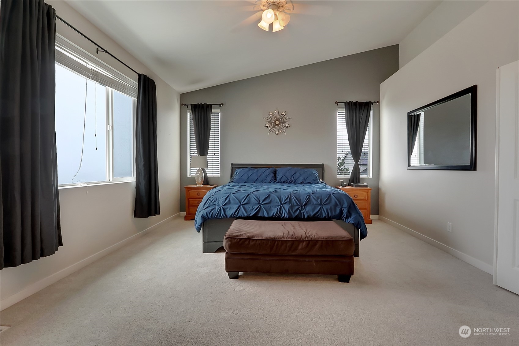 16004 24th Street East Lake Tapps, WA 98391 - Photo 23 of 32 a bedroom with a bed and window
