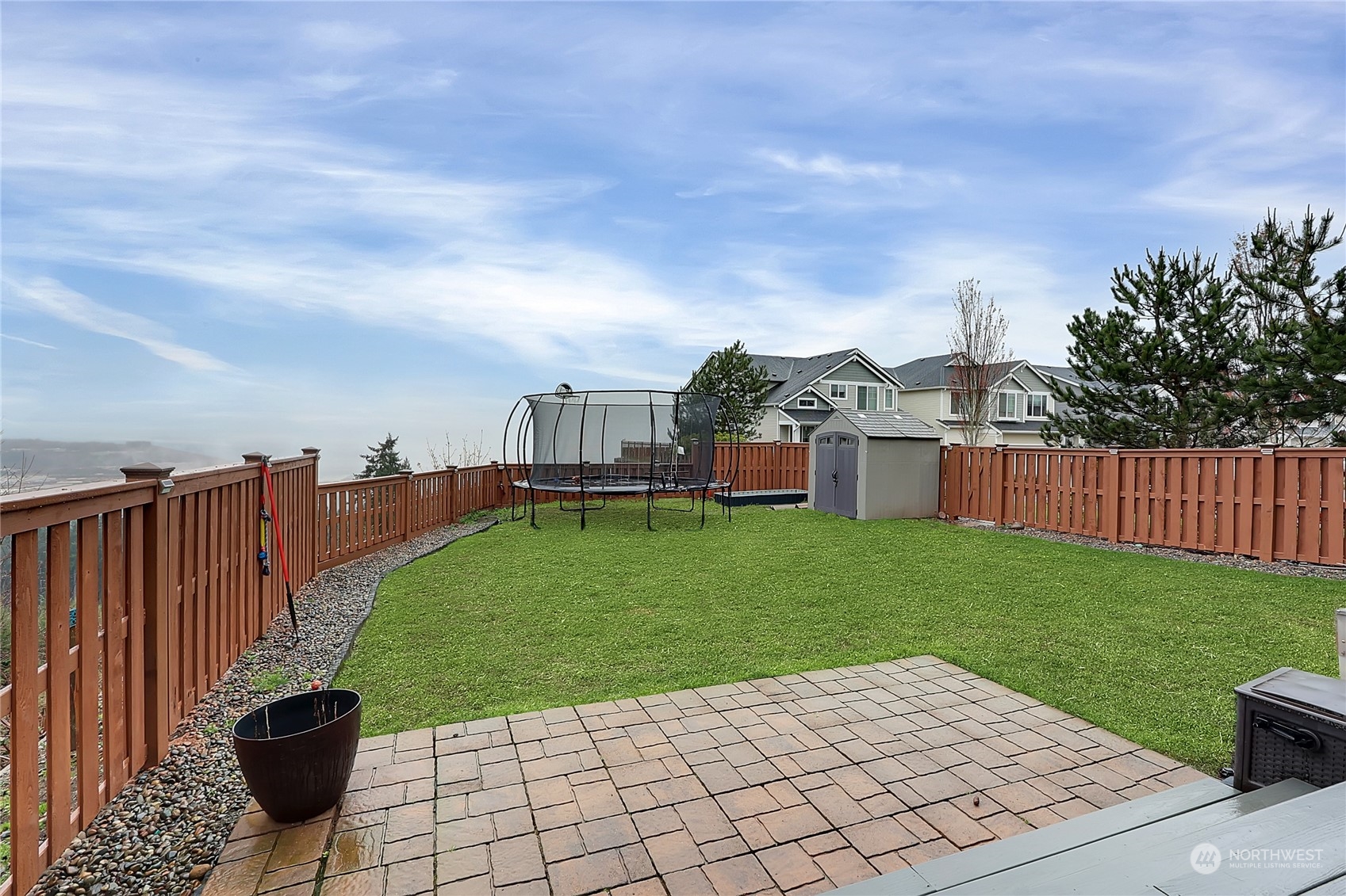 16004 24th Street East Lake Tapps, WA 98391 - Photo 28 of 32 a view of a backyard with a garden