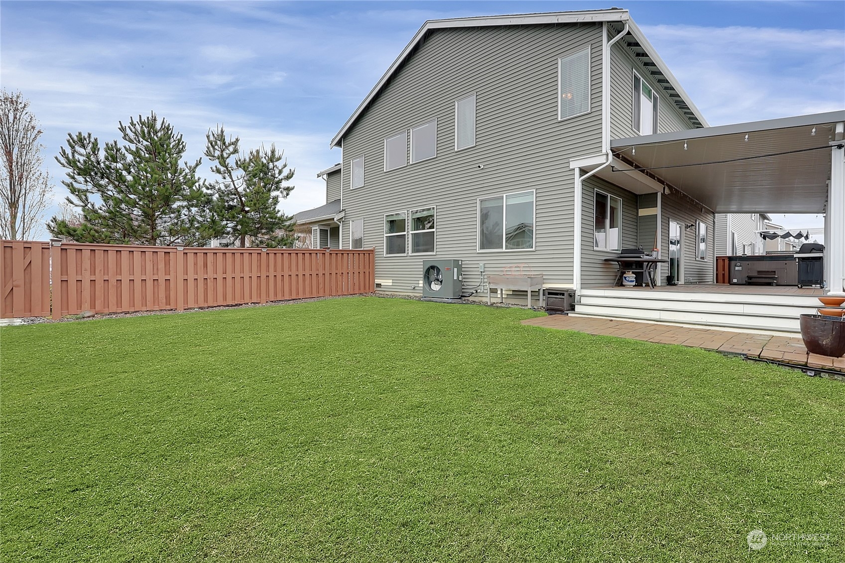 16004 24th Street East Lake Tapps, WA 98391 - Photo 29 of 32 a house view with swimming pool in front of it