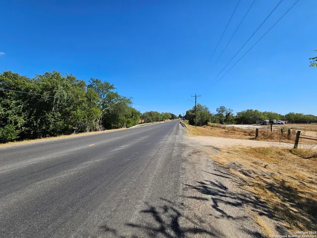 a view of a road with an ocean view