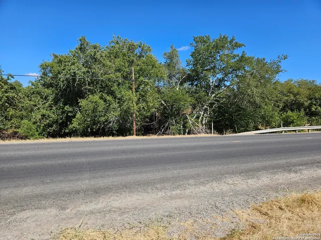 a view of a yard and a mountain view