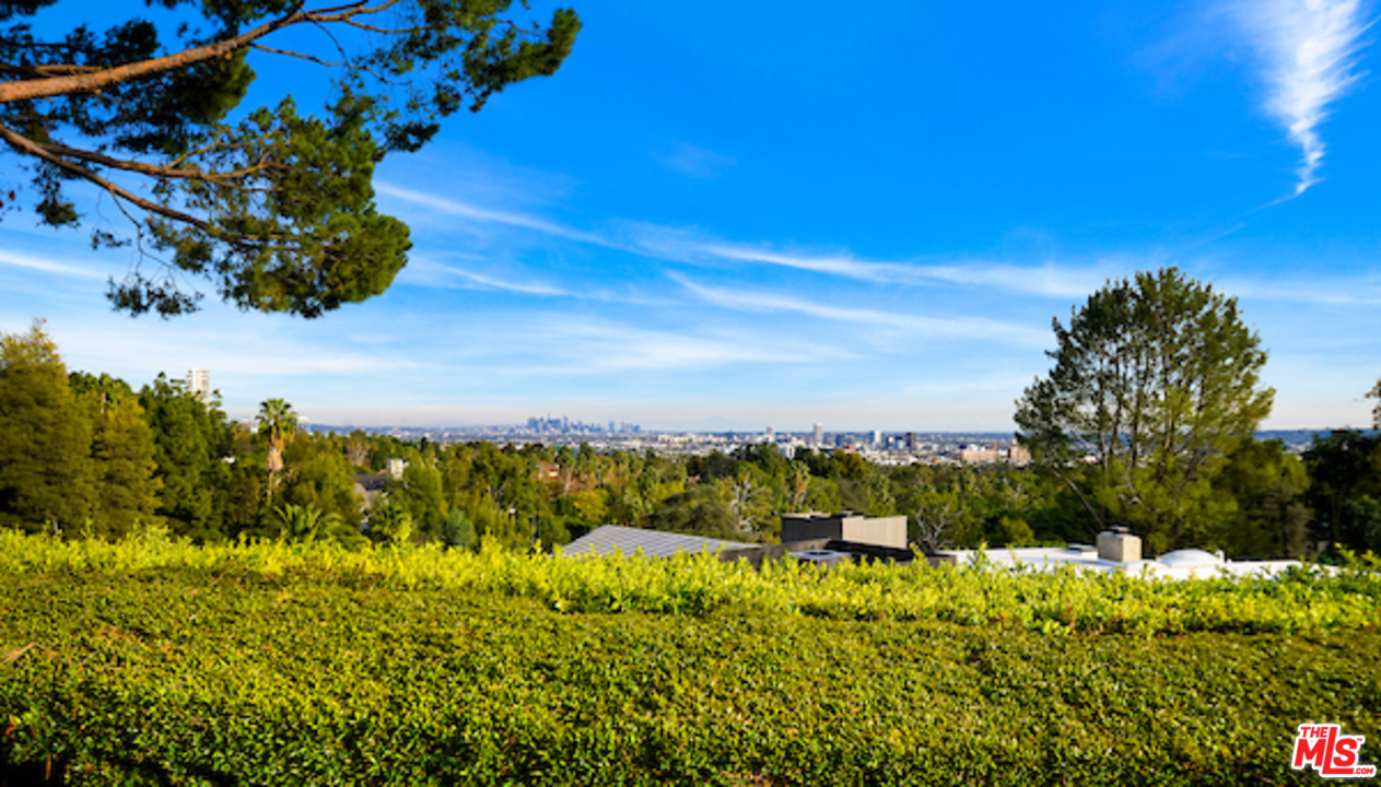 984 North Alpine Drive Beverly Hills, CA 90210 - Photo 5 of 8 a view of a lake
