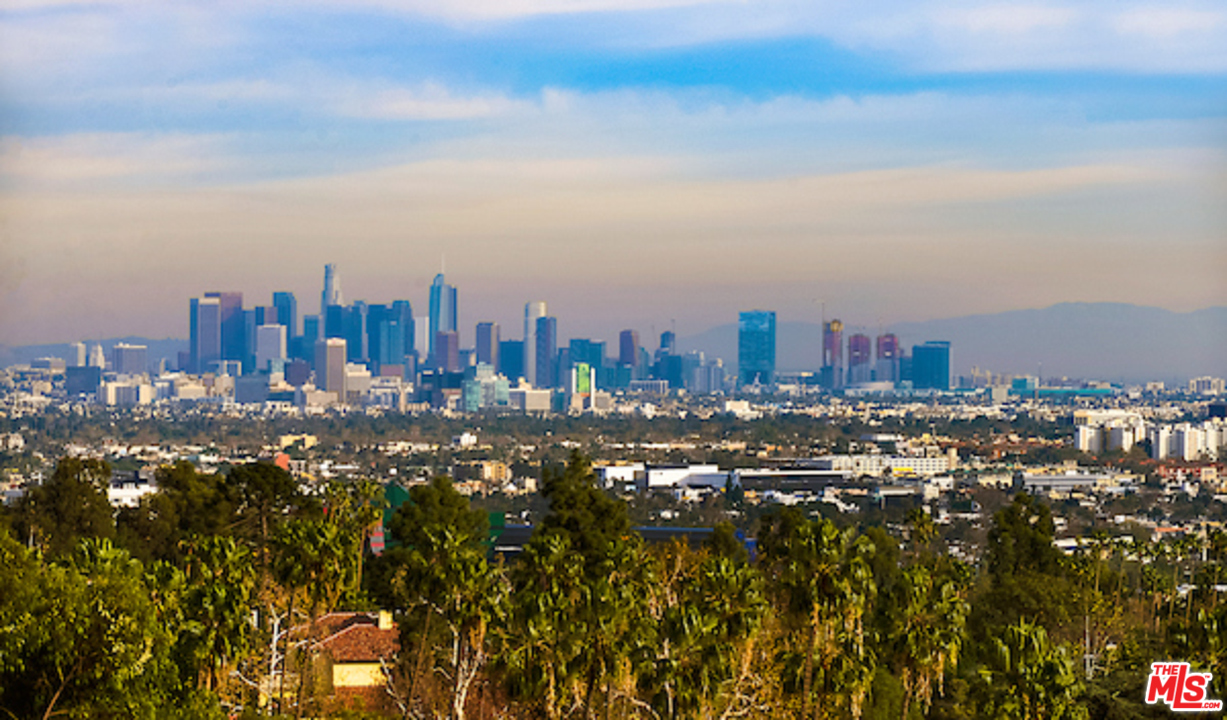 984 North Alpine Drive Beverly Hills, CA 90210 - Photo 7 of 8 a view of a city with tall buildings