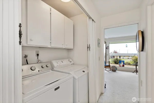 a view of utility room and washer and dryer