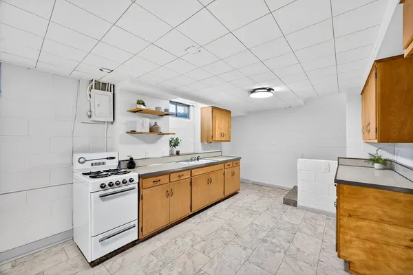a view of a kitchen with a sink