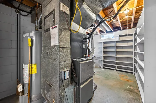 a view of a house with a yard and garage