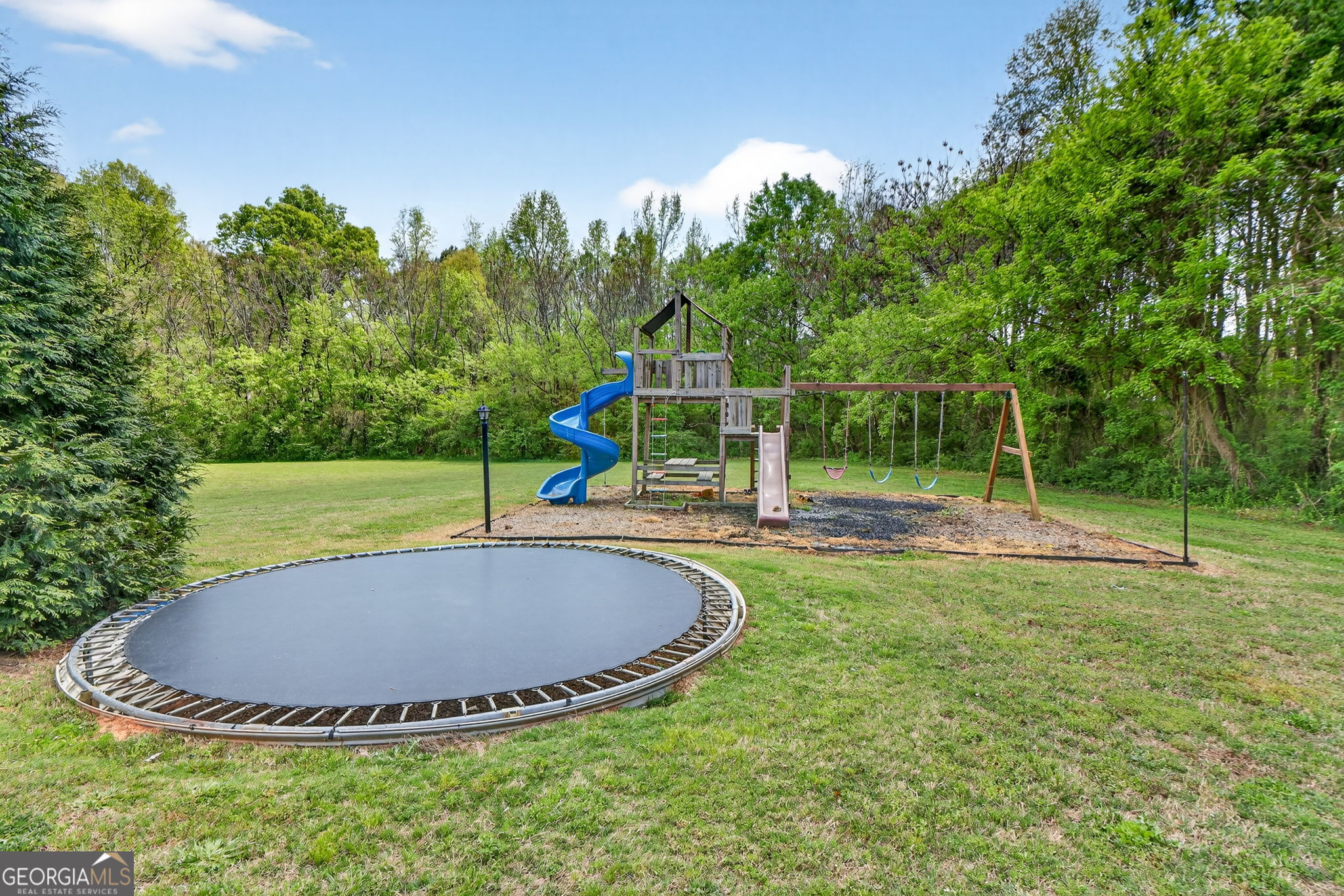 130 Derby Drive Forsyth, GA 31029 - Photo 17 of 97 a view of a swimming pool with a backyard