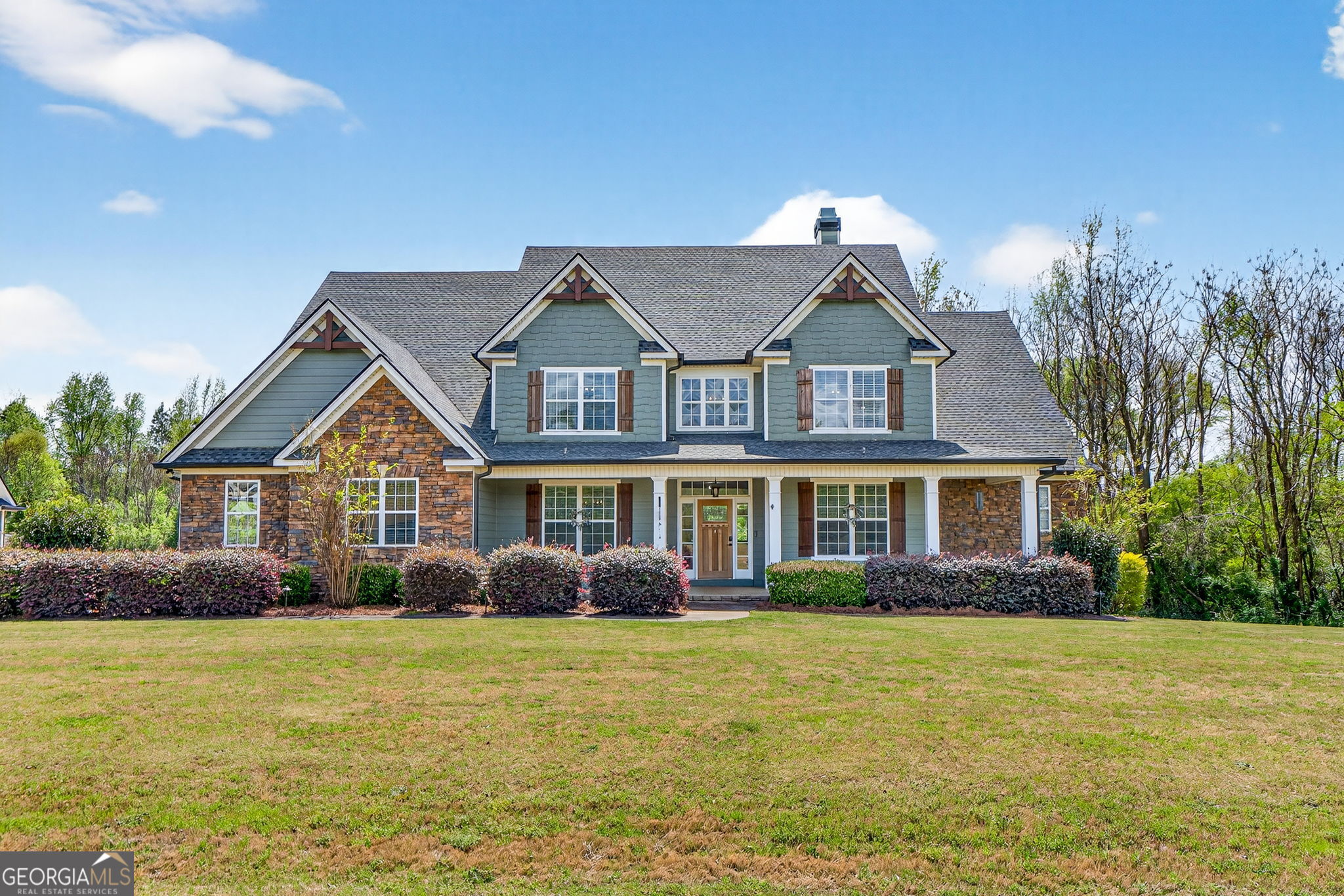130 Derby Drive Forsyth, GA 31029 - Photo 3 of 97 a front view of a house with garden