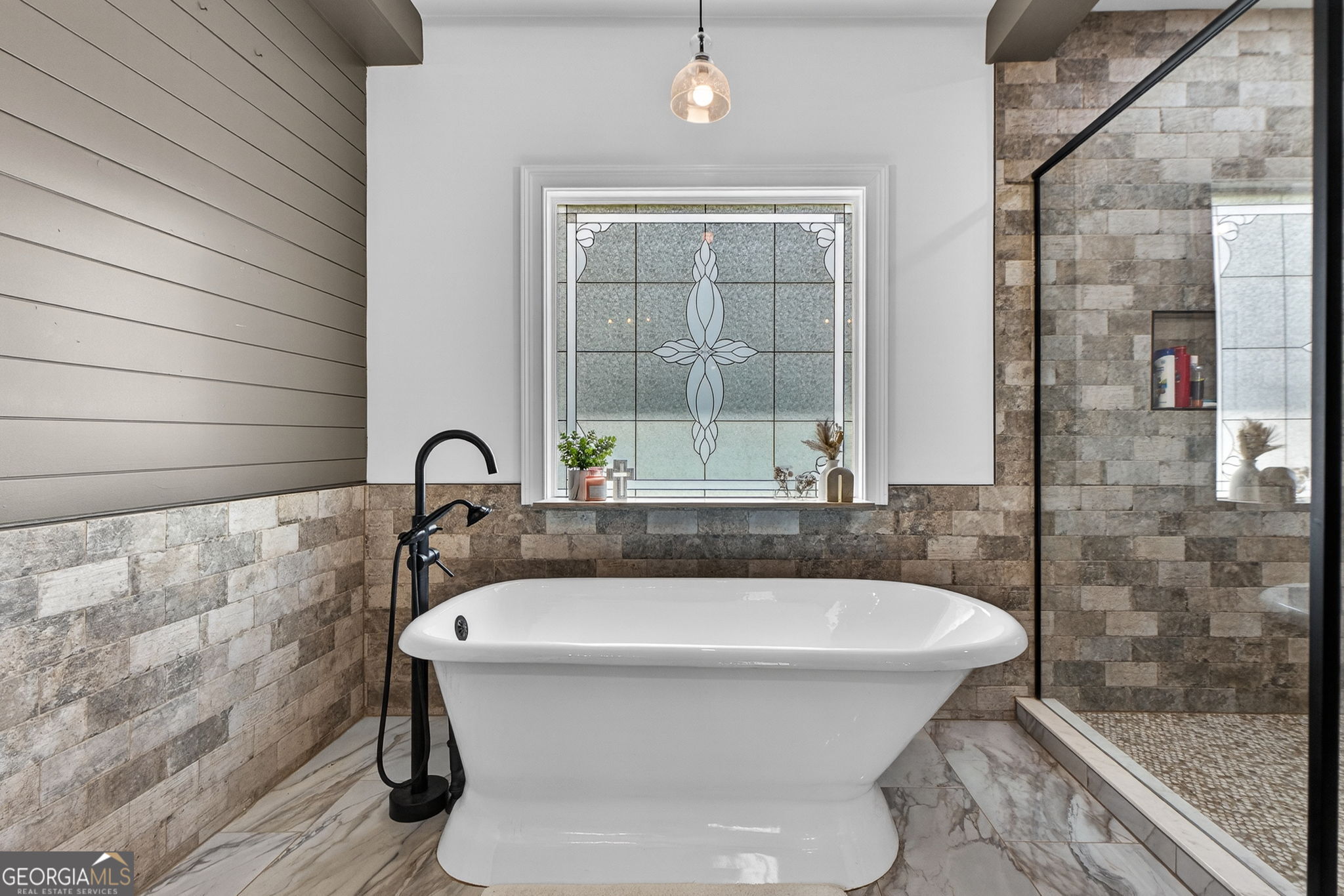 130 Derby Drive Forsyth, GA 31029 - Photo 53 of 97 a white bath tub sitting in a bathroom next to a window