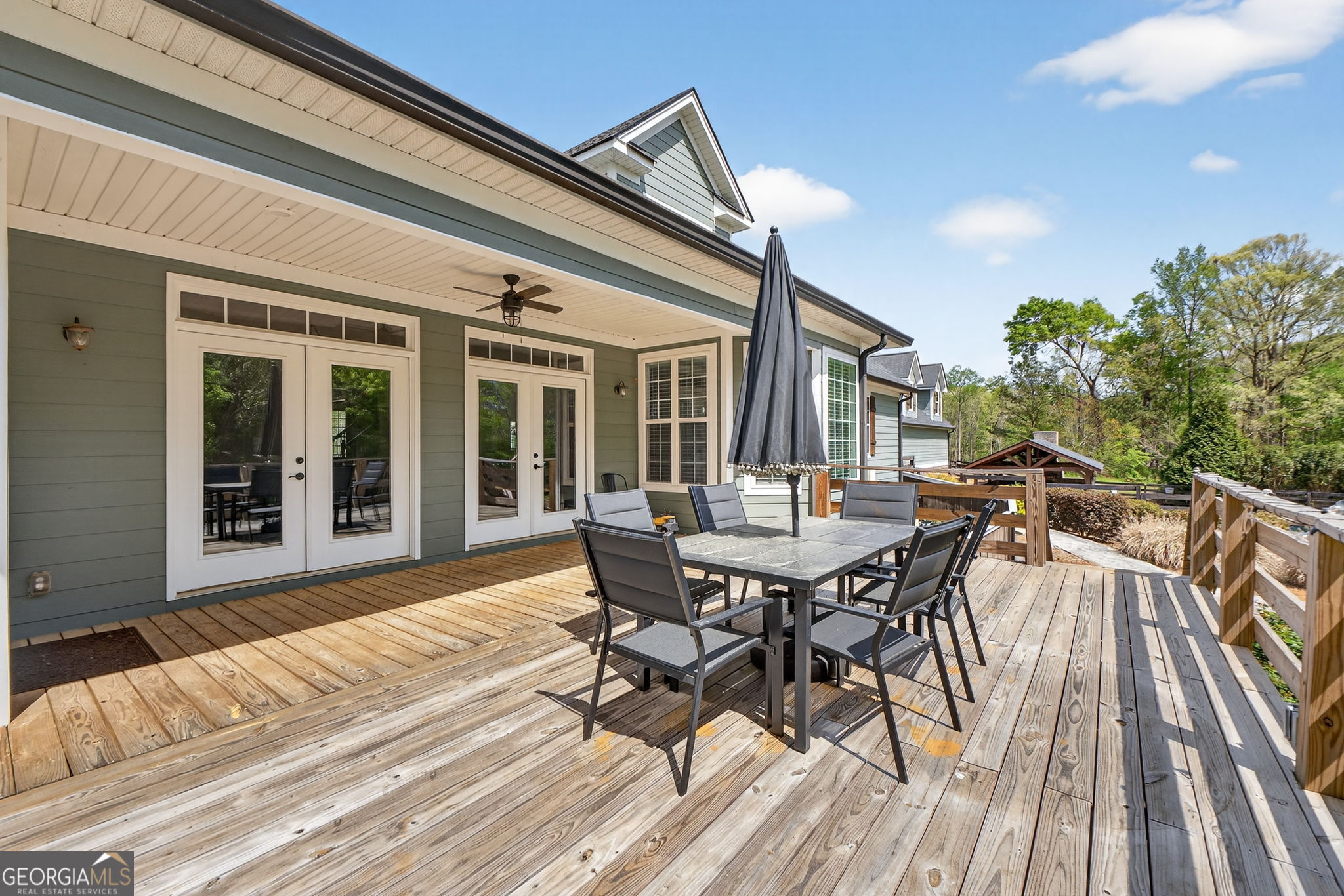 130 Derby Drive Forsyth, GA 31029 - Photo 7 of 97 a view of a patio with table and chairs