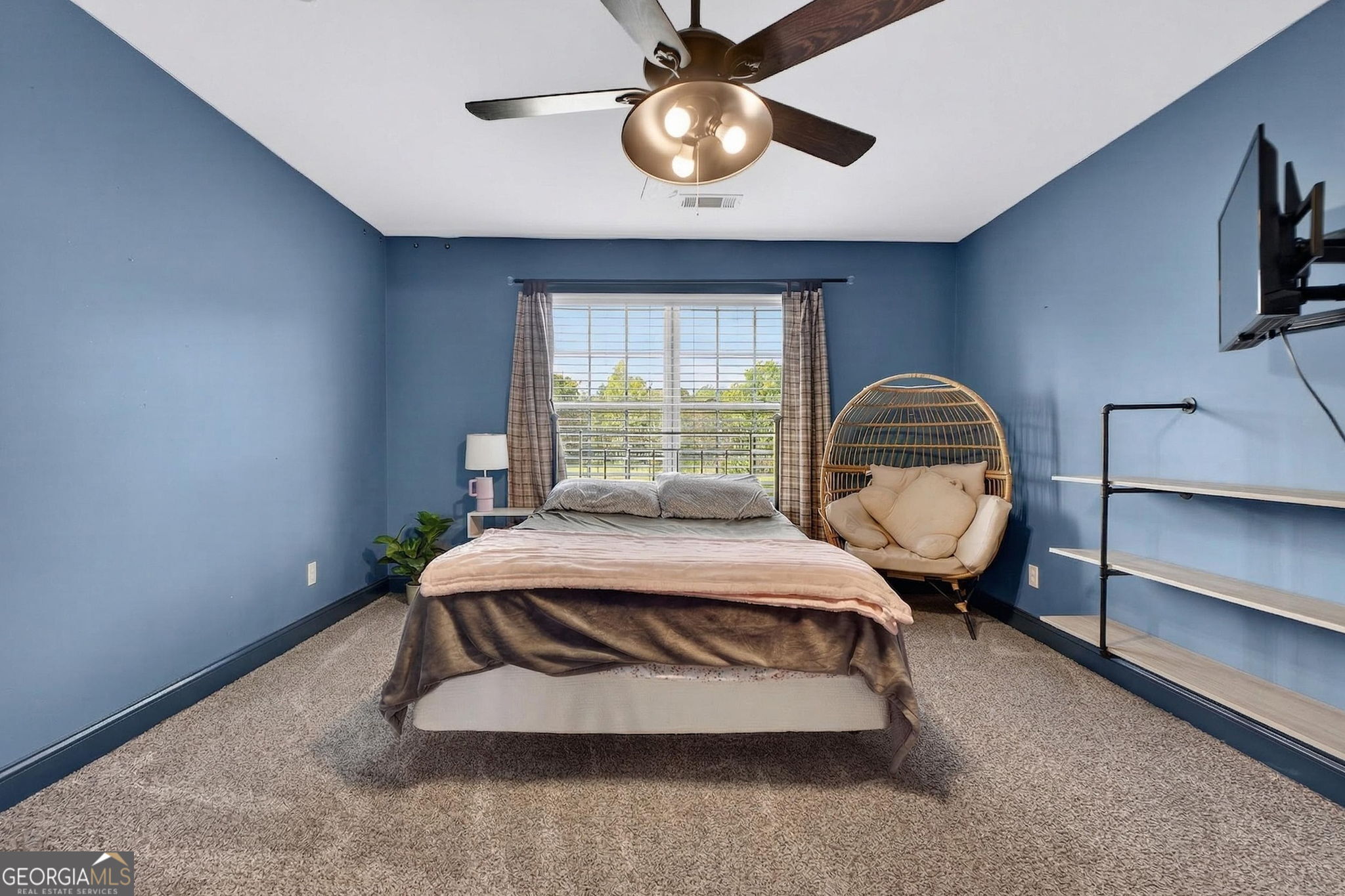 130 Derby Drive Forsyth, GA 31029 - Photo 72 of 97 a bedroom with bed and a window